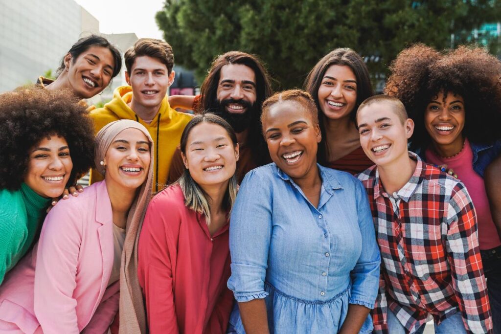 a group of young people smile at the camera while going through depression treatment