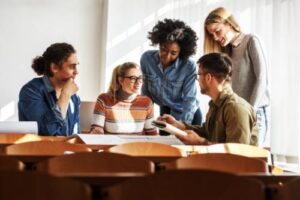 a group of young adults talk about young adult mental health programs 