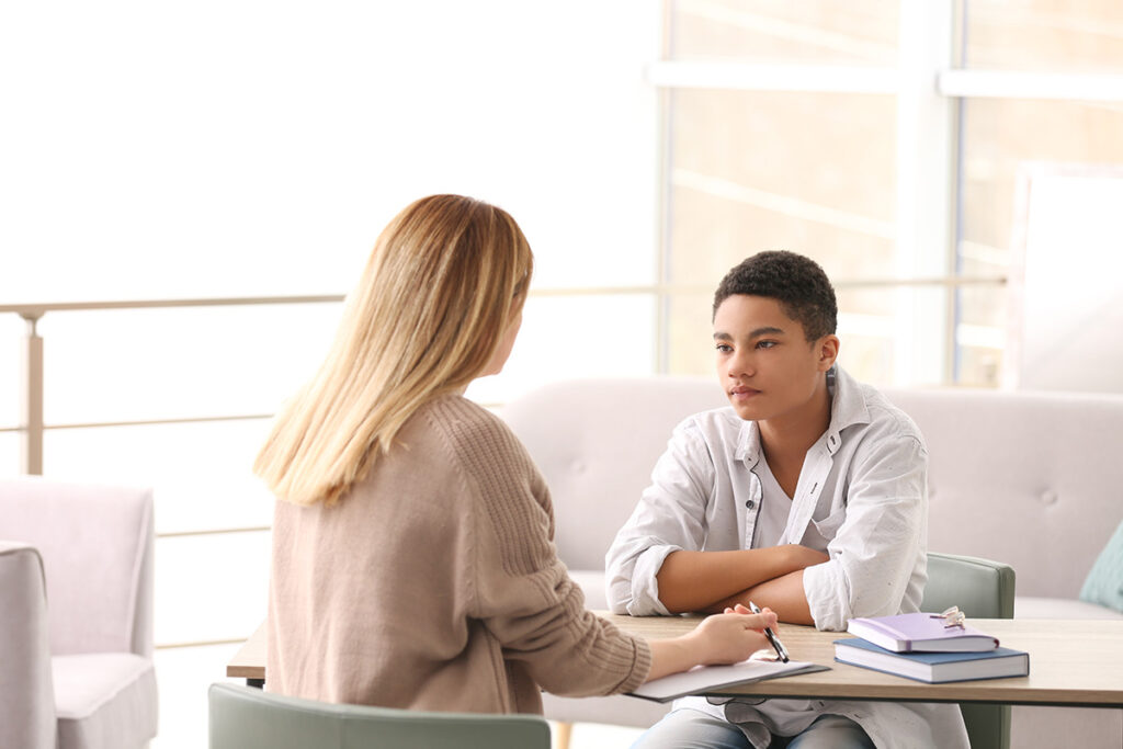 young person in counseling learning about medication management for adolescents